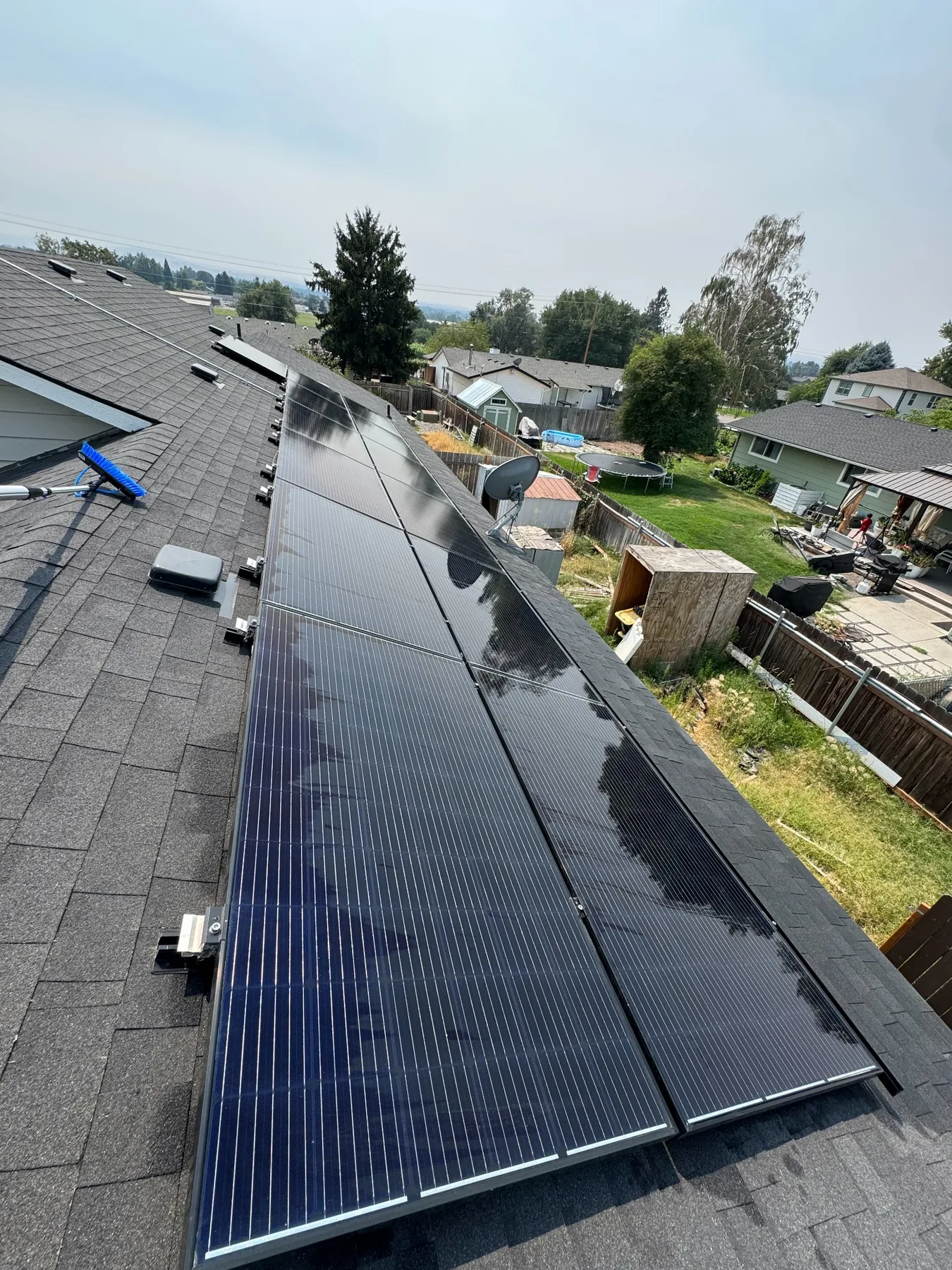 Clean residential rooftop solar panels after professional cleaning in the Tri-Cities Washington